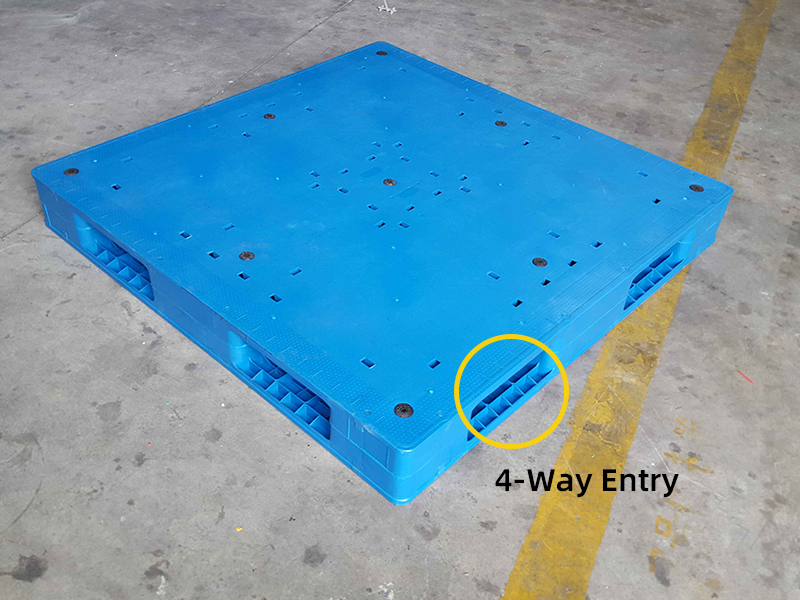 Blue reversible pallet with smooth solid deck and four-way forklift entry structure marked