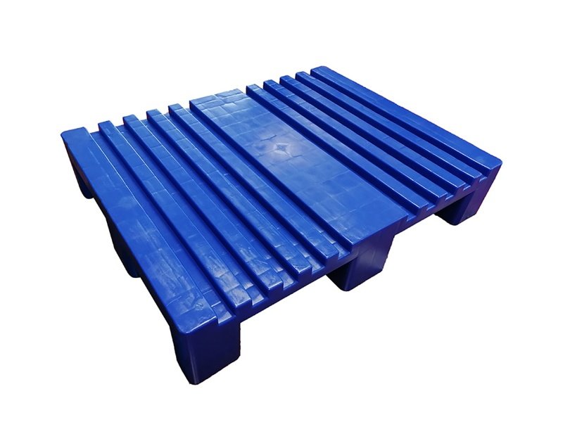 Blue nestable plastic pallet, four - way entry, precision fit for automation.
