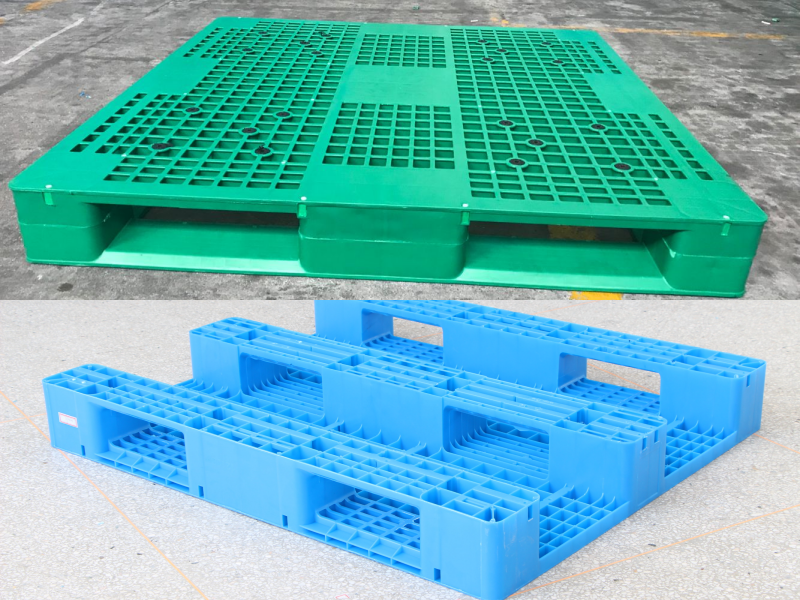 Reinforced full perimeter plastic pallet showcasing seamless welded joints between top deck and base for structural durability.